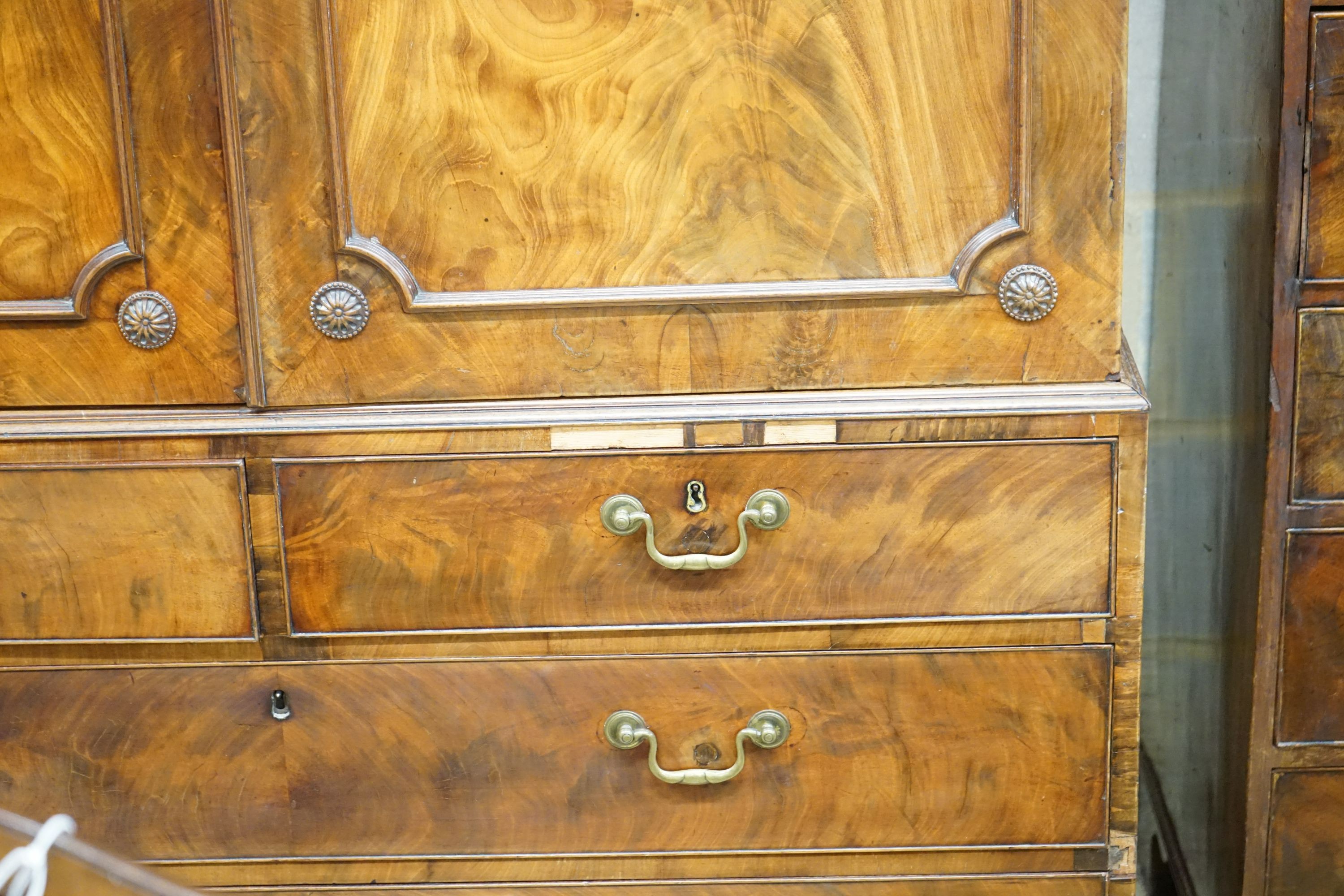 A George III mahogany linen press, width 123cm, depth 60cm, height 198cm